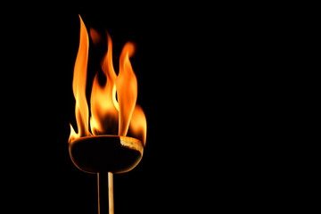 burning flaming torch © jokerpro