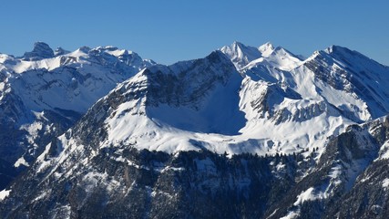 Fototapeta na wymiar Snow covered mountains in Central Switzerland