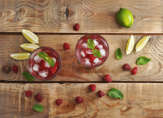 fruit lemonade with raspberries and ice, lime and mint
