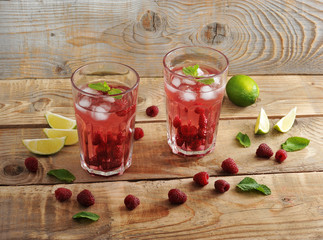 fruit lemonade with raspberries and ice, lime and mint