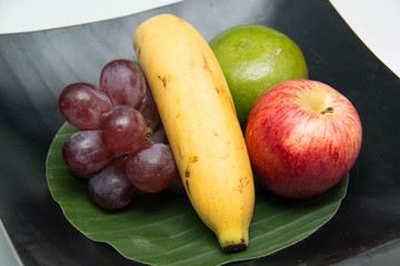 Fresh fruit in a wood bowl