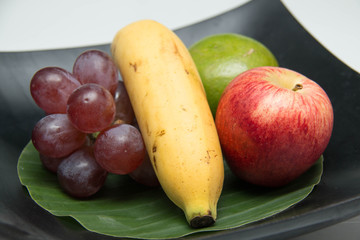 Fresh fruit in a wood bowl