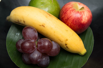 Fresh fruit in a wood bowl
