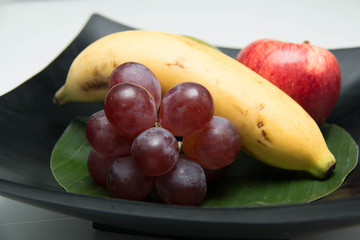 Fresh fruit in a wood bowl