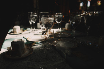 Daylight sparkles over glassware and crockery while rest of the