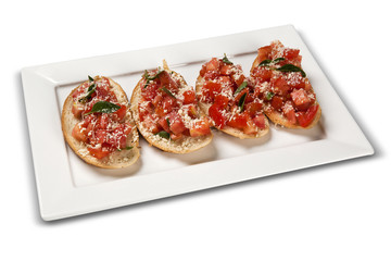 Bruschetta, toast with tomato. White background.