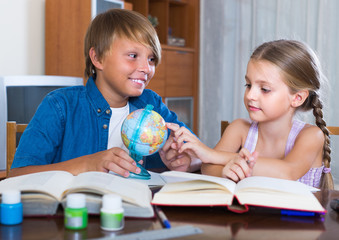 Fototapeta premium Children studying with books indoors.