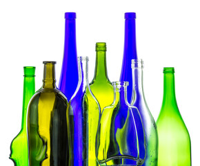 colored empty glass bottles for wine isolated on white background