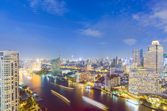 Bangkok city skyline with Chao Phraya River view.