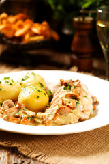 Roasted chicken breast served in a mushroom chanterelle sauce.