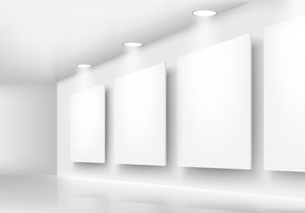 Gallery of empty frames on wall with lighting