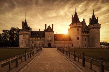 Chateau of Sully-sur-Loire at sunset, France. Old castle in Loire Valley in summer. - obrazy, fototapety, plakaty