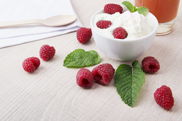 Fresh raspberries with whipped cream