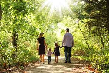 young family walk together