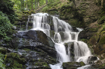 Fototapeta na wymiar Waterfall in the Ukrainian Carpathians