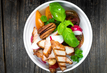 Delicious tapas on a wooden background