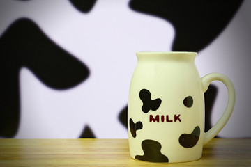 Black and white milk cup on table