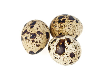 Obraz premium Quail eggs on a white background