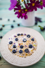 Fototapeta na wymiar Oatmeal with fresh blueberry fruit 