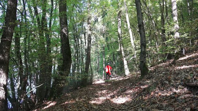  Ride a bike over mountain terrain race track