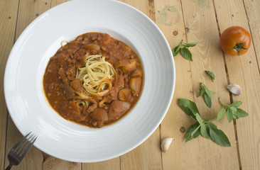 fresh homecook spaghett on wooden table