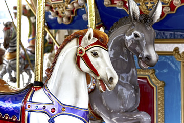 Fototapeta na wymiar Carousel Horse on Brass pole