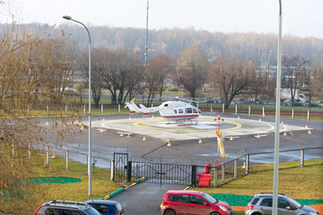 ambulance helicopter on the helipad in the park