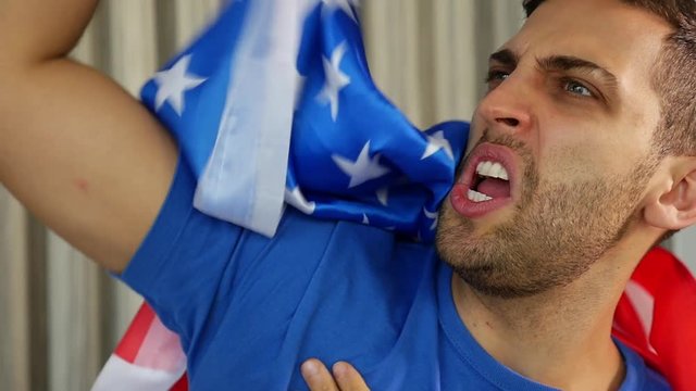 American Guy Celebrating with Flag - in Slow Motion