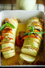 Baked zucchini stuffed with vegetables