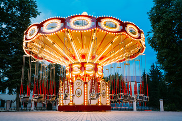 Brightly Illuminated Empty Carousel Merry-Go-Round. Nobody