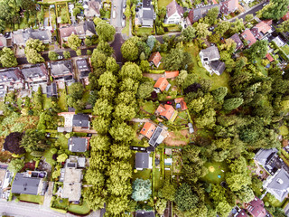 Aerial view of Dutch town, houses with gardens, green park