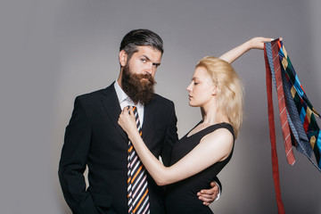 young couple with tie