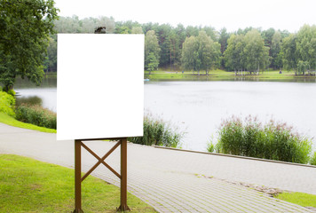 Mock up. Vertical blank billboard in park