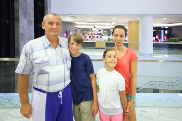 Obraz premium A woman and elderly man with boy and girl (with model release) in the vestibule of the Hotel Radisson Blu Paradise Resort and Spa