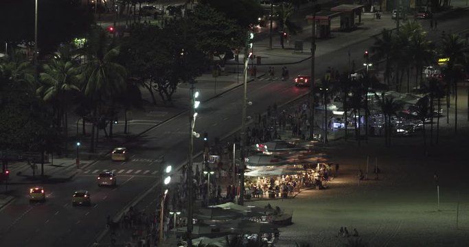 Food stands at night nearby Copacabana Beach, Rio de Janeiro, Brazil