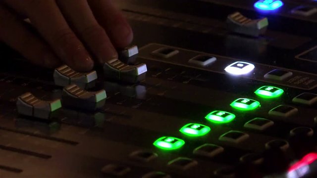  Music concert audio mixer operator closeup