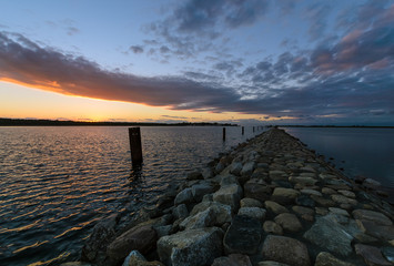 Fototapeta na wymiar Sunset on the bird Paradise in Baltic sea