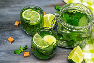 Glasses with mojito  on dark  wooden background