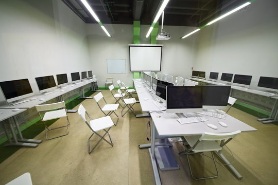 Light office with many computers and balopticon at British Higher School of Art and Design.
