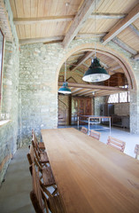 view of rustic open space with mezzanine