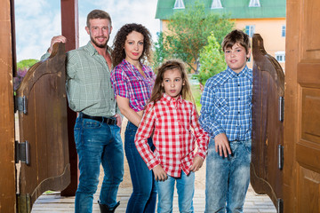 family of four ging to enter wild west saloon