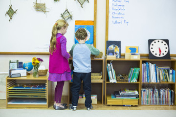 Caucasian children standing in classroom