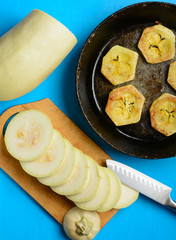 Fried courgette in the pan