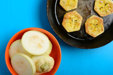 Fried courgette in the pan
