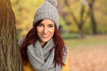 Happy woman with a gray cap