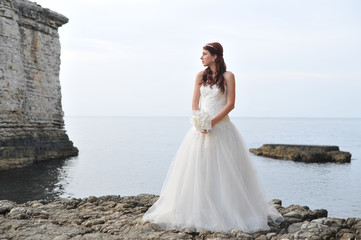 Fototapeta na wymiar beautiful young bride women wearing white wedding dress