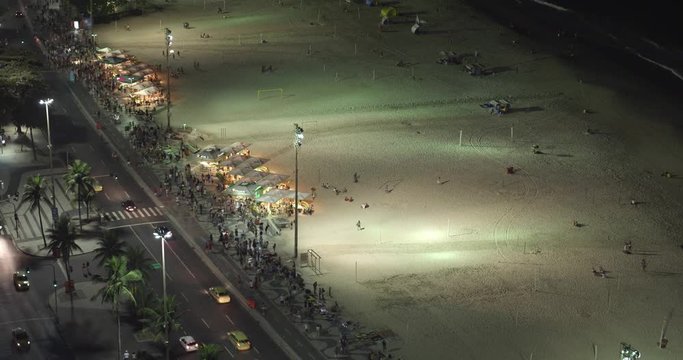Food stands at night nearby Copacabana Beach, Rio de Janeiro, Brazil