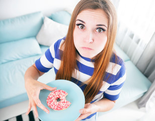 Woman on diet caught during eating donut