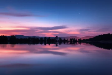 Fotobehang Beautiful night landscape on the mountain lake with stars and reflected clouds in water in spring.Colorful sky. Nature background  © den-belitsky