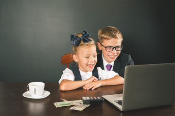 Business or school kids uses a laptop computer